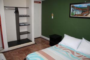 HotelIam Armenia - Encanto y descanso en el corazon del Quindio