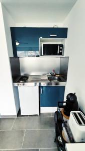 Appartements Les Soleillades - Plage, piscine, parking! : photos des chambres