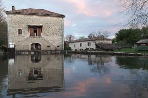 Maisons de vacances Gite Moulin de Lausseignan : photos des chambres