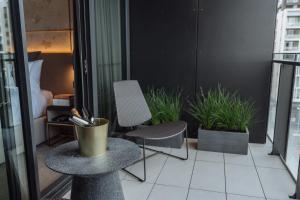 Two-Bedroom Apartment with Balcony - One Bathroom room in SKYE Suites Green Square