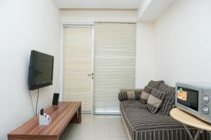 Cozy and Minimalist 2BR at Marbella Kemang Apartment By Travelio
