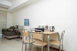 Cozy and Minimalist 2BR at Marbella Kemang Apartment By Travelio