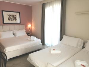 Deluxe Quadruple Room room in Hotel San Pietro Palace