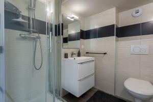 Appartements Le 21 -GregIMMO-Appart'Hotel : photos des chambres