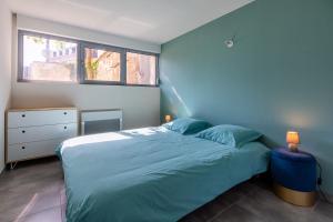 Appartements Le 21 -GregIMMO-Appart'Hotel : photos des chambres