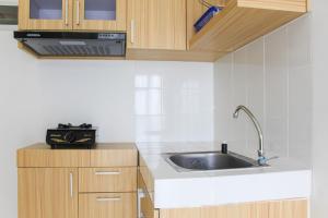 Golf View 1BR Apartment at M-Town Residence By Travelio