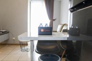 New Furnished with City View 2BR Apartment M-Town Residence By Travelio