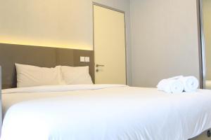 New Furnished with City View 2BR Apartment M-Town Residence By Travelio