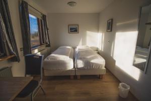 Twin Room with Shared Bathroom room in Ormurinn Guesthouse