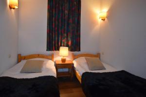 Appartements VAUJANYLOCATIONS - Claret II Apt 12 : photos des chambres