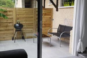 Appartements Petit Cocon Cosy avec Terrasse : photos des chambres