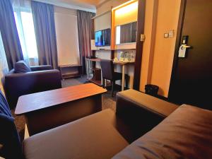 Family Suite with 2-way day time airport transfer room in Elate Plaza Hotel