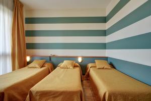 Triple Room room in Astor Hotel
