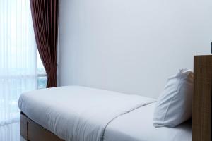 Homey and Modern 2BR Apartment at Atlanta Residence By Travelio