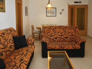 AT116 Els Pins, comunidad con piscina en 1ra línea de la playa