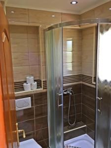 Apartment (2 Adults + 1 Child) with Terrace and Sea View room in Garni Hotel Bokeška Noć