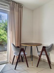 Appartements Studio en face Hopital Nord avec terrasse : photos des chambres