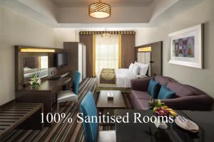 Family Studio room in Savoy Central Hotel Apartments