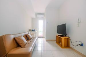 Homey 2BR Apartment at Springlake Summarecon Bekasi By Travelio