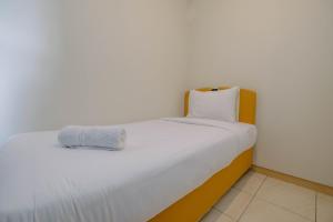 Homey 2BR Apartment at Springlake Summarecon Bekasi By Travelio