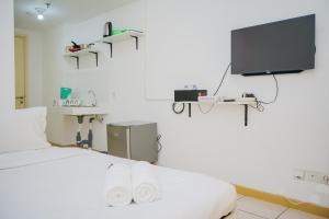 Minimalist Studio Apartment at M-Town Residence By Travelio