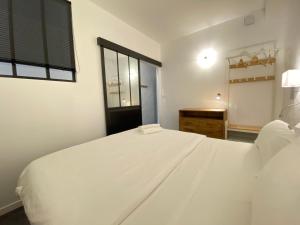 Appartements Boutique Hotel Un Appart en Ville : photos des chambres