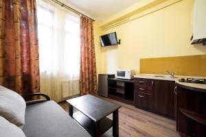 Апартаменти на площі Митній