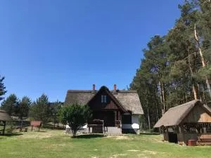 DOM POD STRZECHĄ - Płęsno