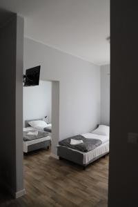 Quadruple Room room in Hotel Sportowy