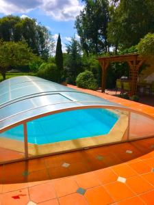 Appartements Lilly bulles en Champagne piscine et jardin privee : photos des chambres