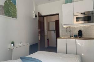 Appartements Appart' Studette Cosy a 15min de Paris La Defense : photos des chambres