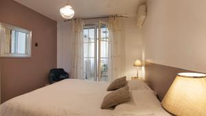 Appartements Mare appart avec jardin et bbq vue mer et montagne plage et port a 2 pas : photos des chambres