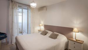 Appartements Mare appart avec jardin et bbq vue mer et montagne plage et port a 2 pas : photos des chambres