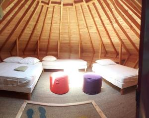 Tentes de luxe Tipis Du Petit Buisson : photos des chambres