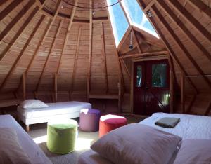 Tentes de luxe Tipis Du Petit Buisson : photos des chambres