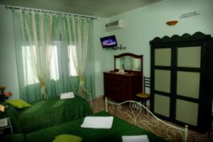 Chambre Triple - Vue sur Ville