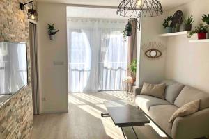 Studio cosy 30 m2 climatisé au centre ville de LGM