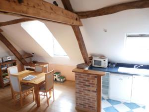 Appartements La Porte Bleue : photos des chambres