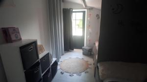 Maisons de vacances La Roseraie : photos des chambres