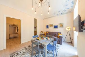 GuestHost - Ortigia Promenade