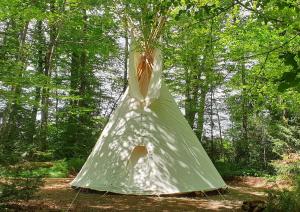 Tentes de luxe Tipi - Camping Le Soustran : photos des chambres