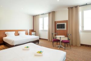 Hotels Hotel Lyon-ouest : Chambre Familiale (2 Adultes + 2 Enfants jusqu’à 14 Ans) - Non remboursable