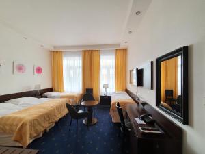 Quadruple Room room in Royal Plaza