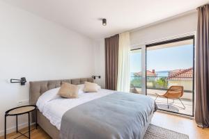 Villa Auni Grey - Heated Pool - Rooftop - Seaview - Beach