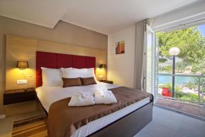 Double Room with Balcony and Side Sea View room in TUI Blue Kalamota Island