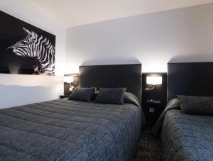 Hotels Cit'Hotel Stim'Otel : photos des chambres