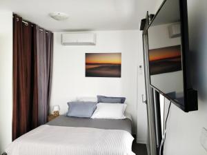 Appartements Cosy Lodge Studio confortable et spacieux avec jardin : photos des chambres