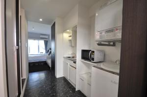 Beach Front Tower Mihama by DSH