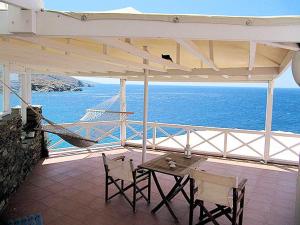 Apartment with one bedroom in Ormos Kardianis with wonderful sea view furnished terrace an Tinos Greece