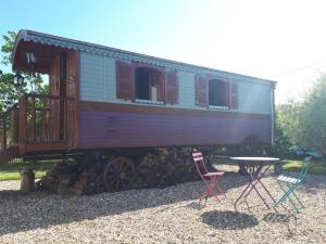 Maisons de vacances La roulotte de Glorit : photos des chambres